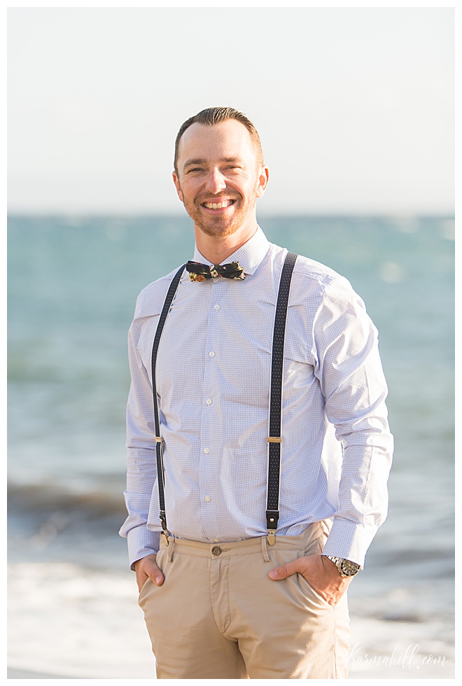 beach wedding groom with suspenders