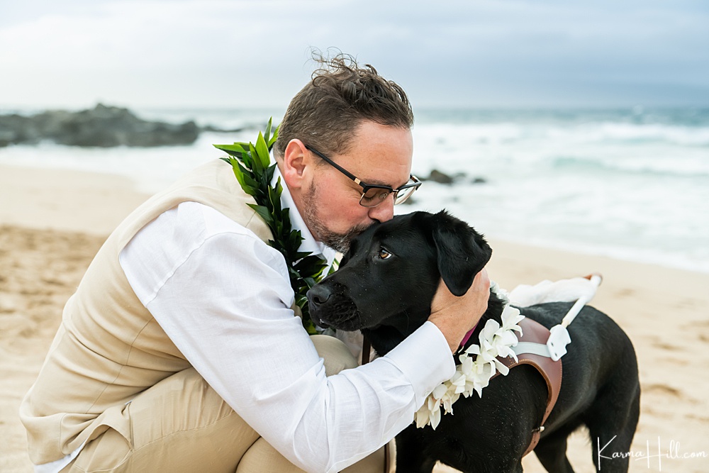 wedding ceremony on beach - man with dog 