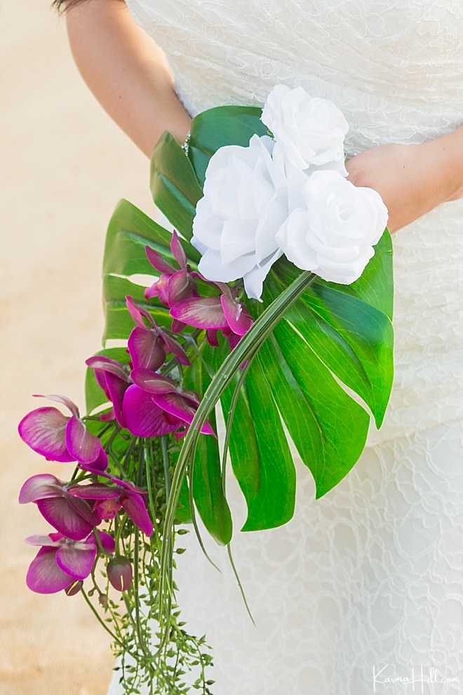 hawaiian wedding bouquet with monstera leaf and orchids