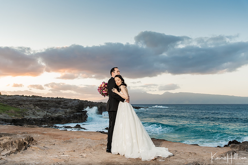 bride and groom embracing - epic wedding portrait - top maui wedding photography - best wedding photographers on Maui 