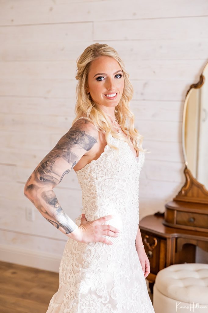 gorgeous blonde bride with arm tattoos  