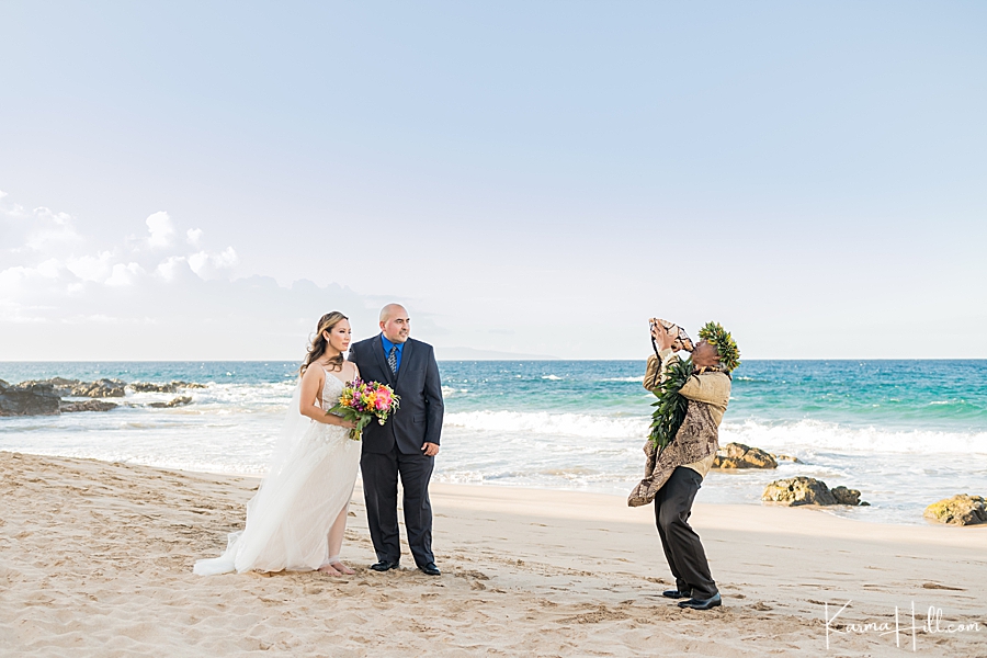 Maui Elopement - minister blowing conch shell 