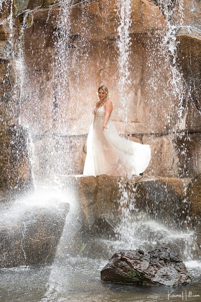 Bride under waterfall