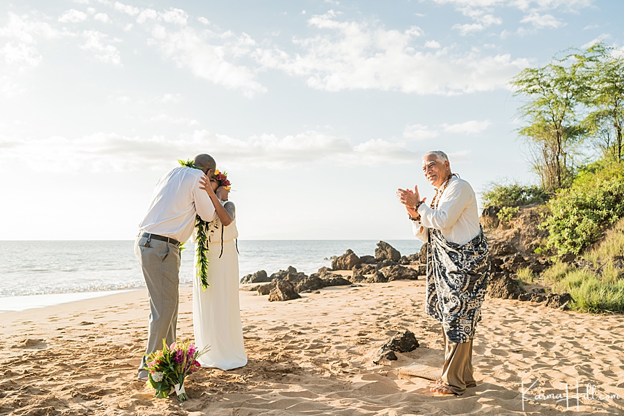 Maui beach wedding first kiss