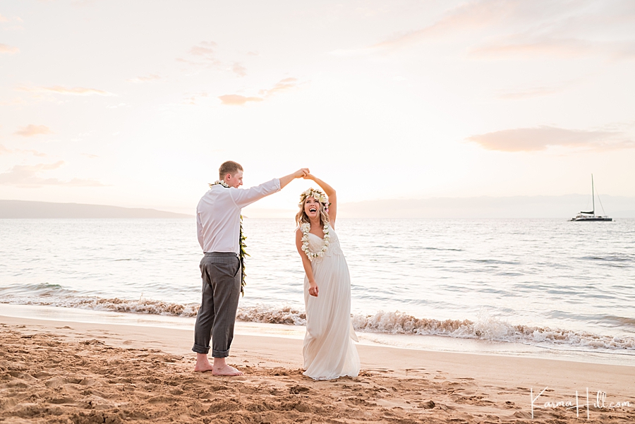 bride and groom against the hawaiian sunset 
