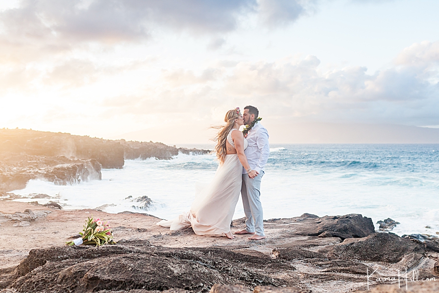 epic wedding photo on maui cliff side with ocean and waves 