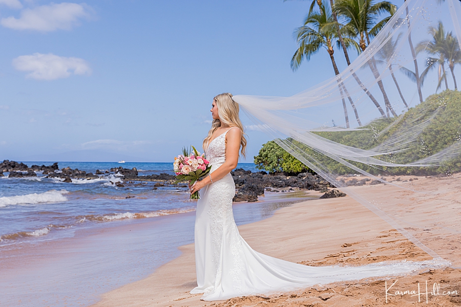 dramatic veil photograph with bride on maui beach 