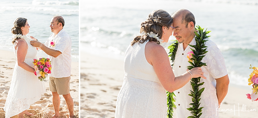 bride and groom exchange leis during their wedding in hawaii 