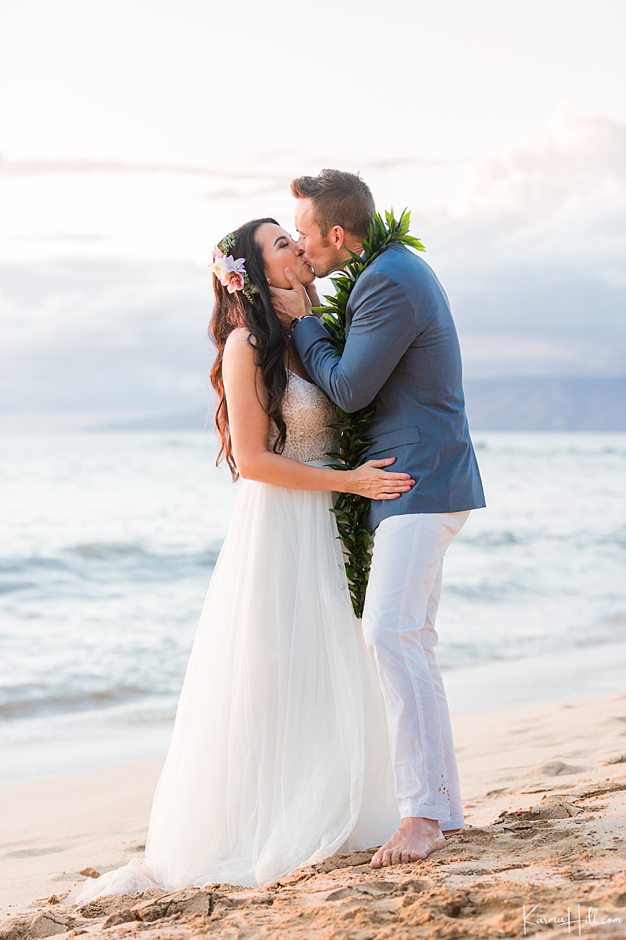 wedding kiss on maui beach 