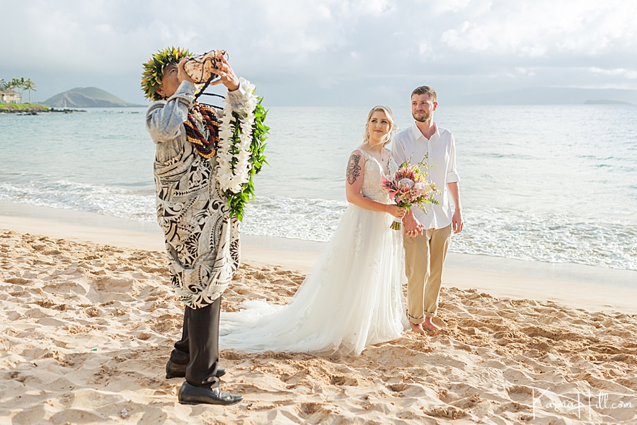 hawaii wedding reverend blows the conch shell 