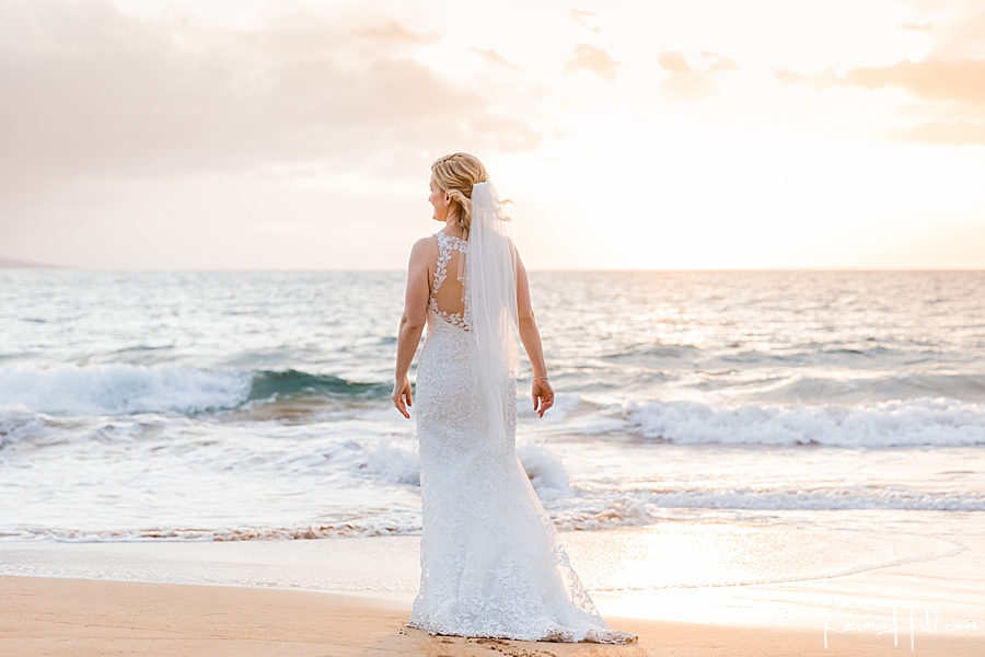 bride in front of a sunset on maui 