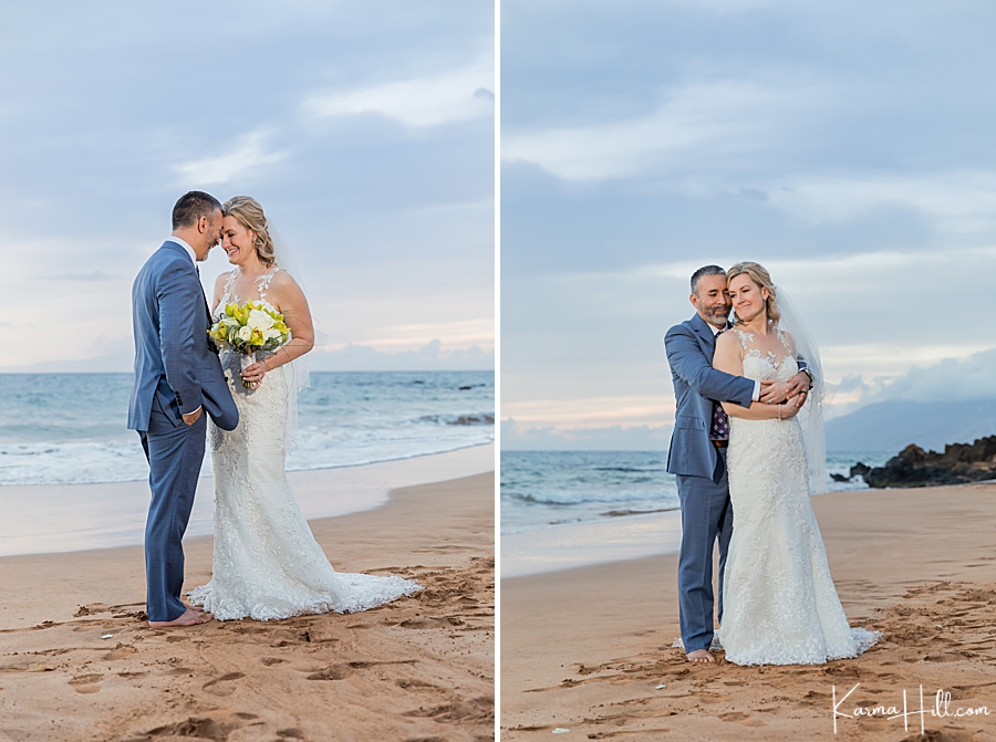 newly weds embrace on a hawaii beach 