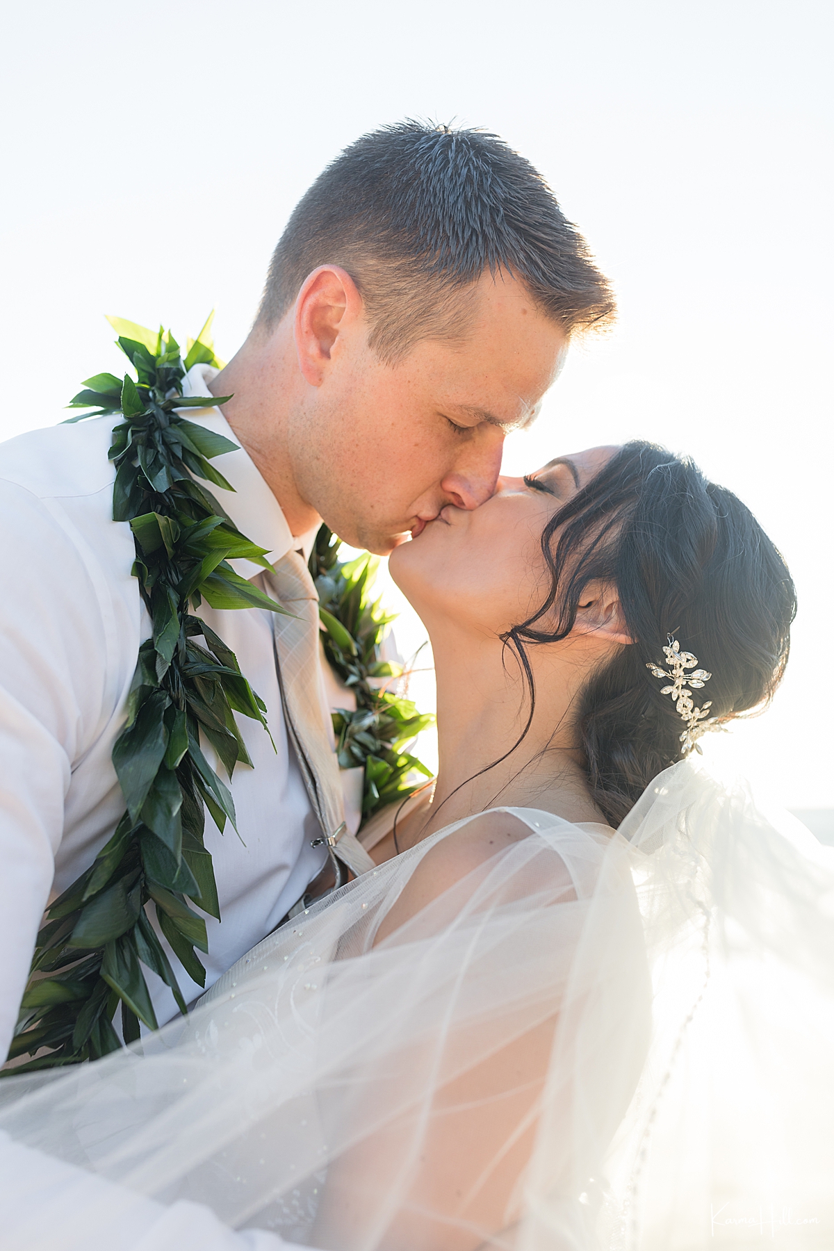 beautiful maui wedding on the beach first kiss 