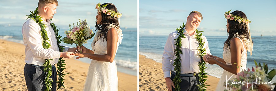 couple exchange rings during wedding in hawaii 