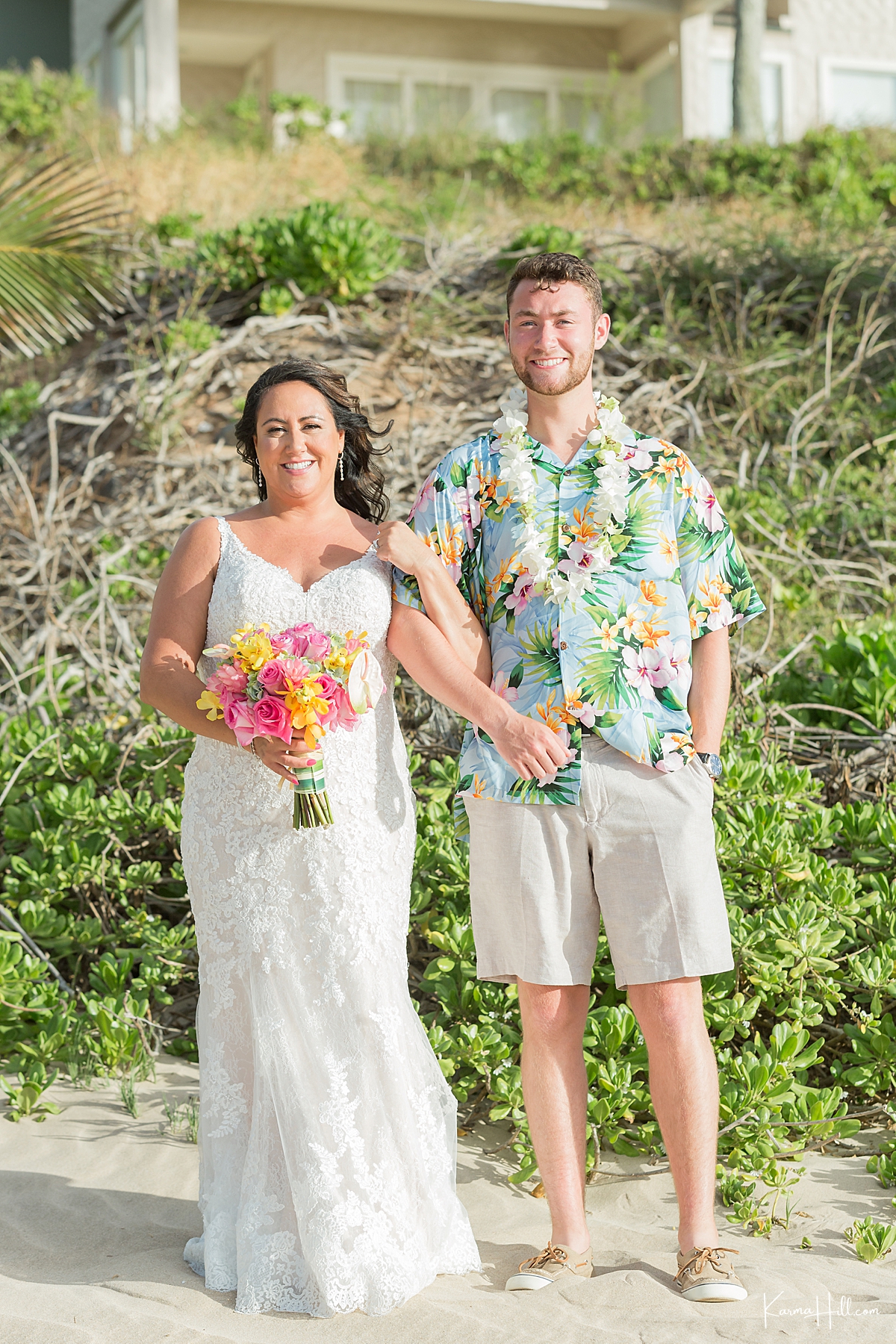 bride walks down the beach during her intimate maui wedding 