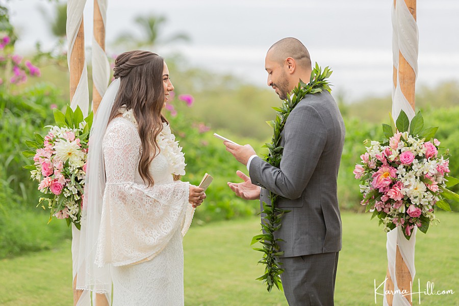 groom telling vows to bride