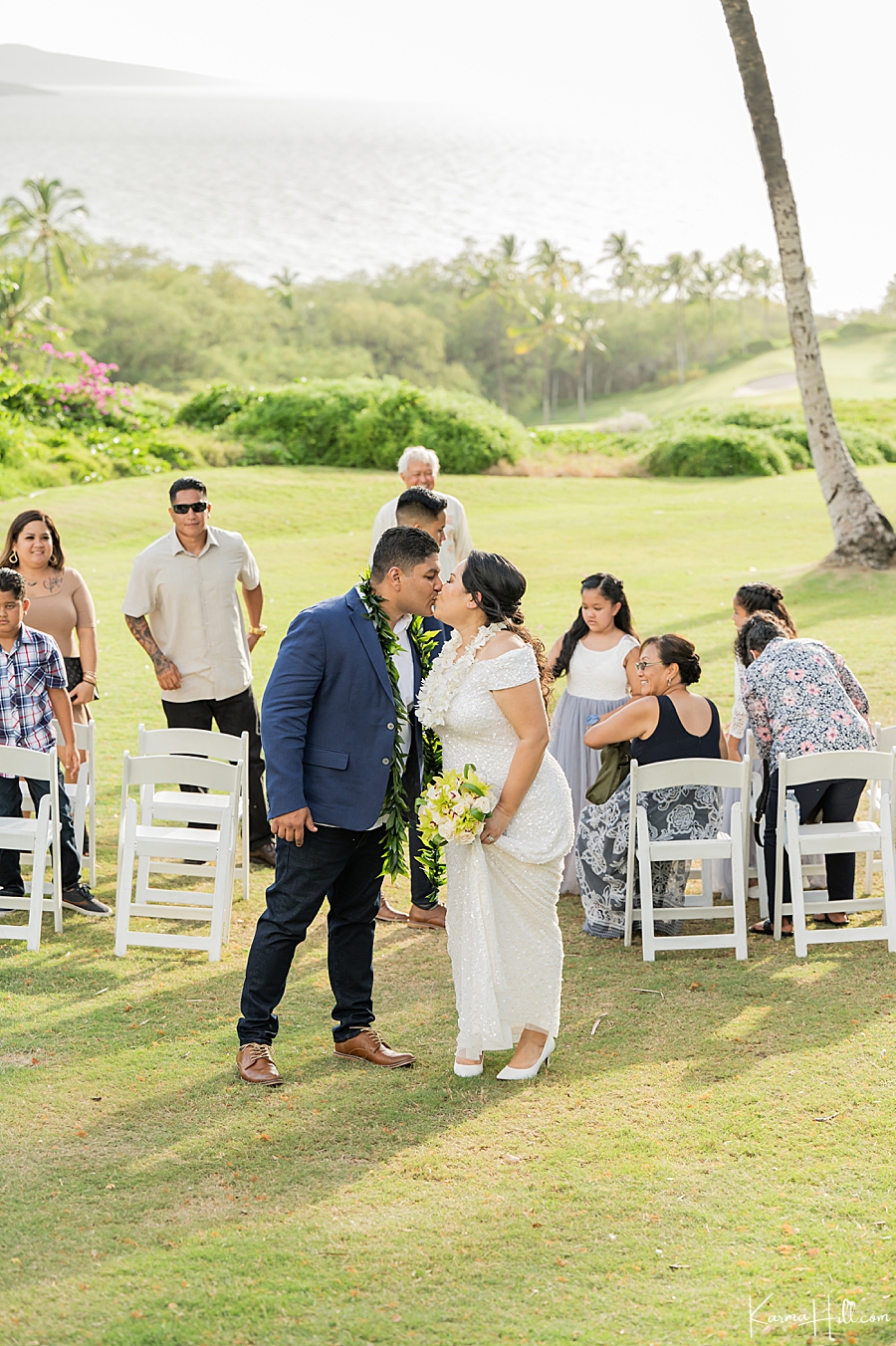 Maui hawaii bride and groom kiss