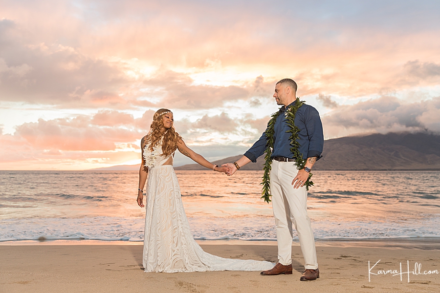 bride and groom at Maui beach sunset wedding