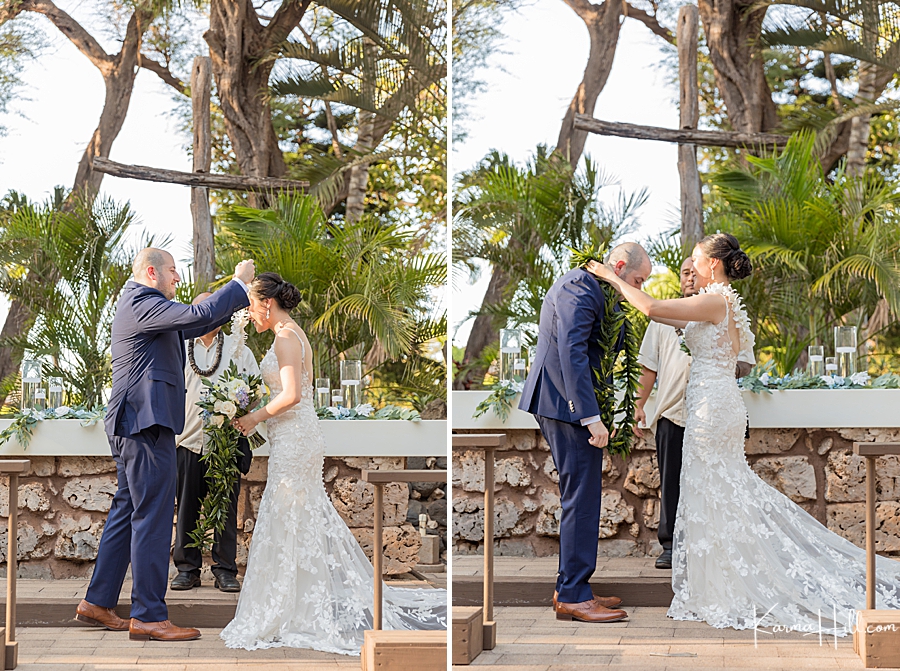 bride and groom exchange leis at maui wedding
