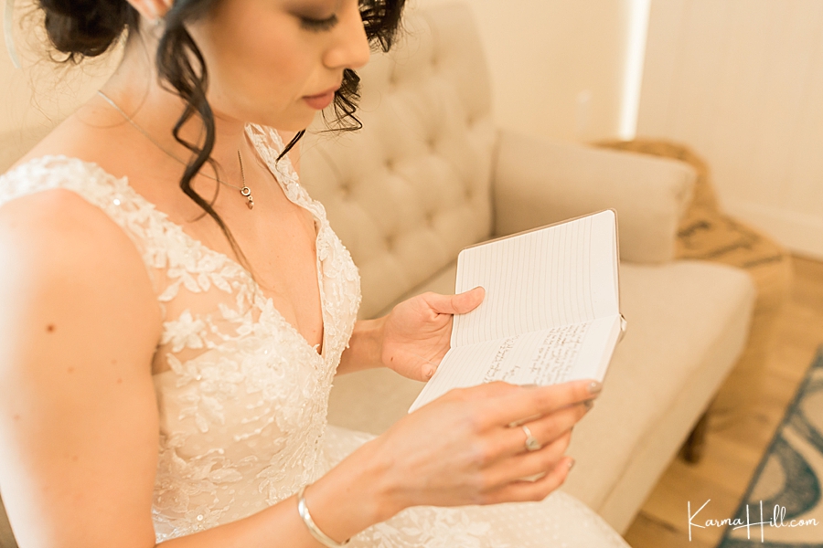 bride reading vows from groom