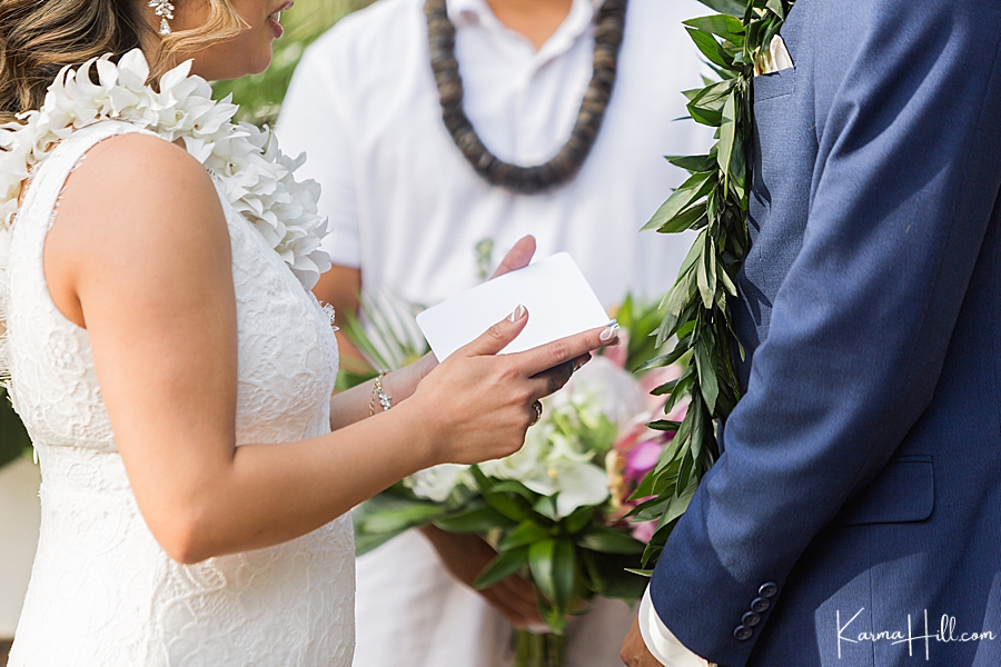 bride telling groom vows at hawaii venue wedding
