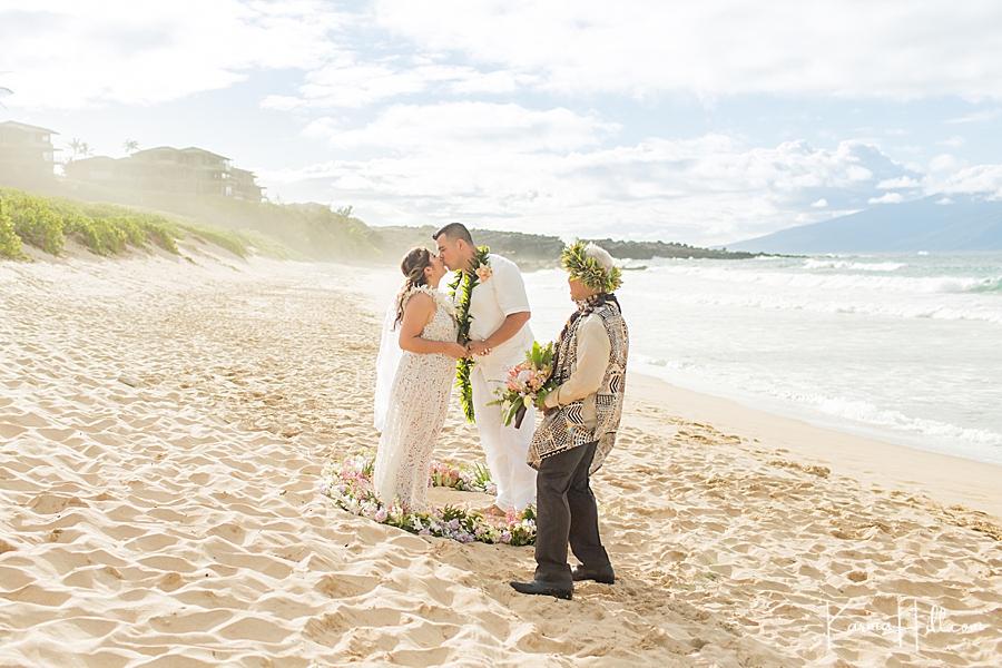 bride and groom wedding kiss photographer maui