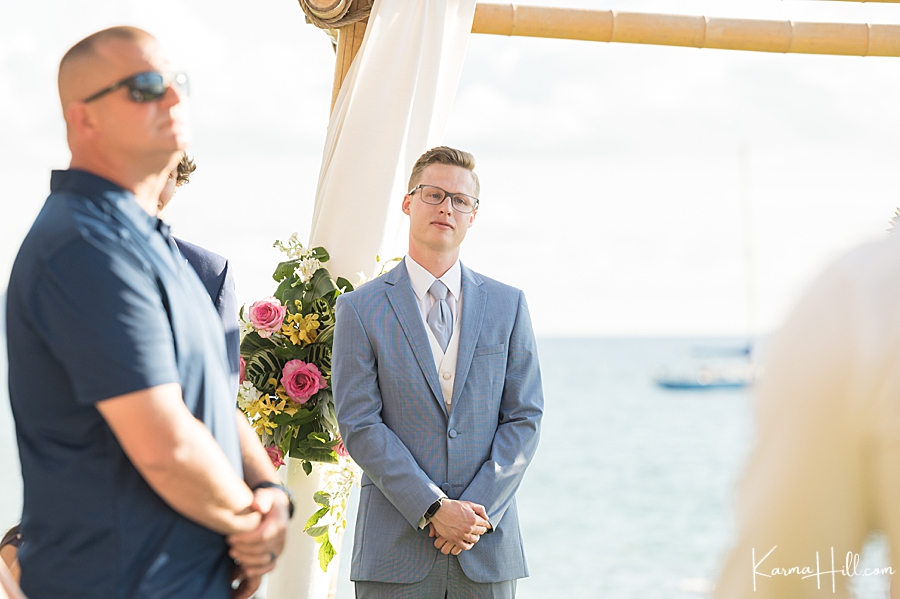 groom standing at altar at hawaii wedding