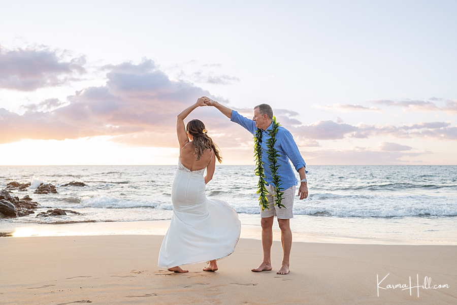 Sunset beach wedding in Maui

