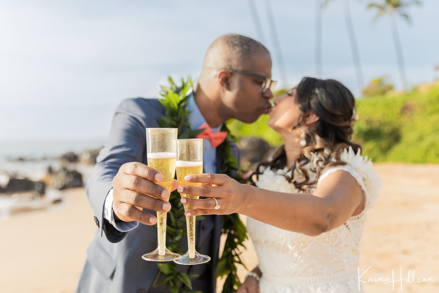 bride and groom doing wedding toast at maui elopement