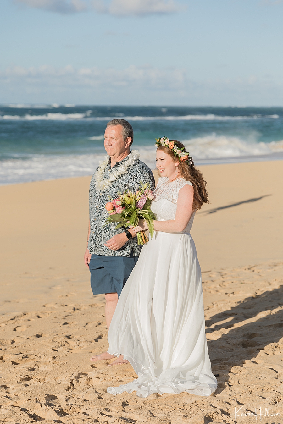 bride walking down aisle at baldwin beach wedding maui