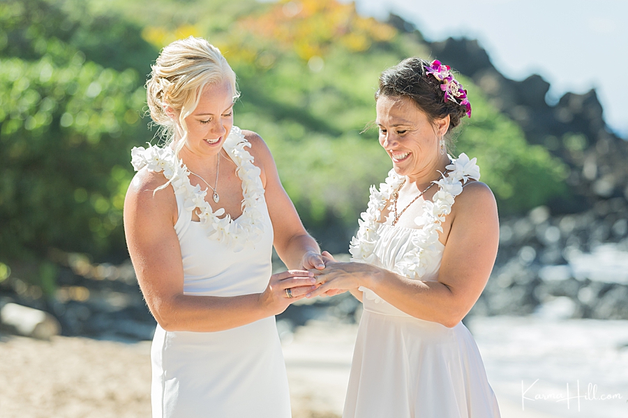 brides exchanging ring at hawaii wedding