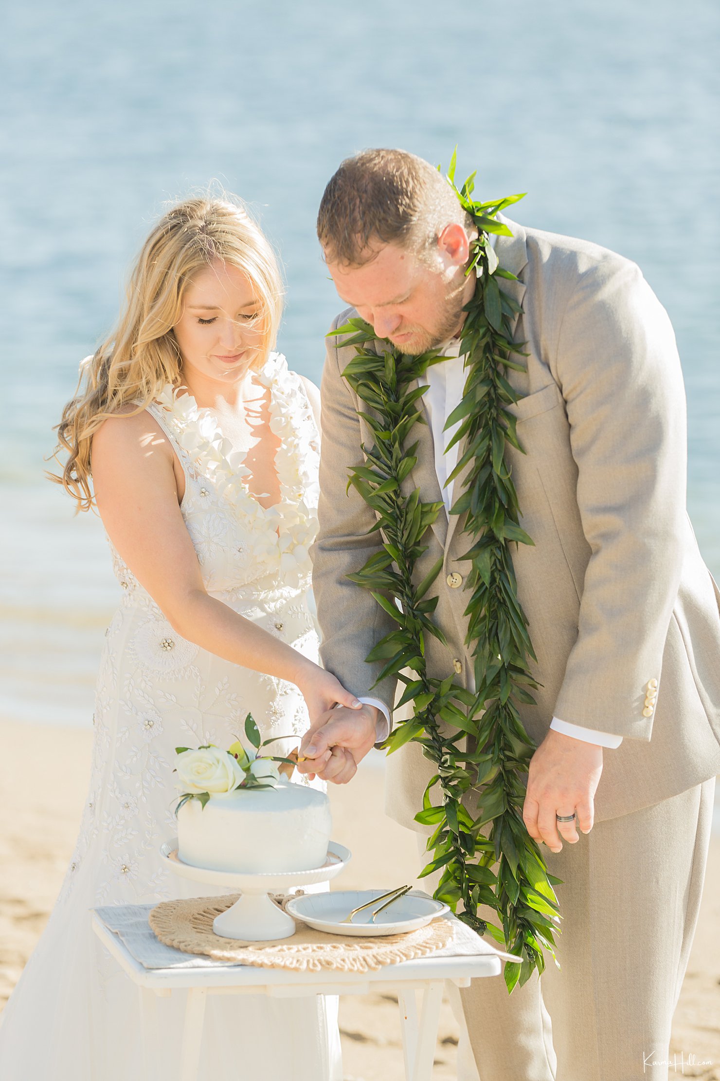 cake cutting ceremony at maui wedding