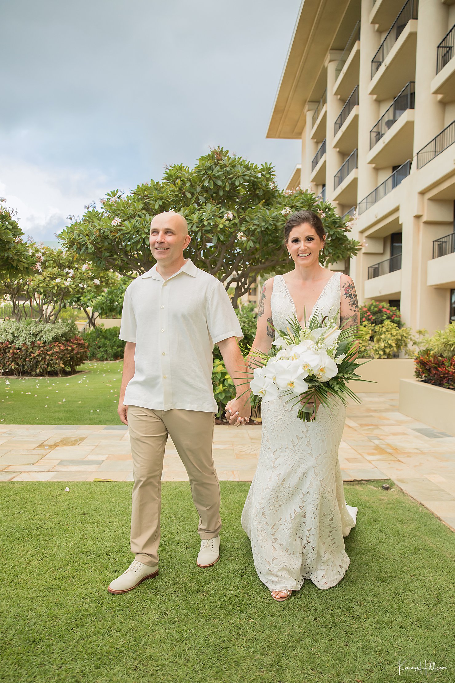 Bride & Groom entering together for their Four Seasons Wedding Maui