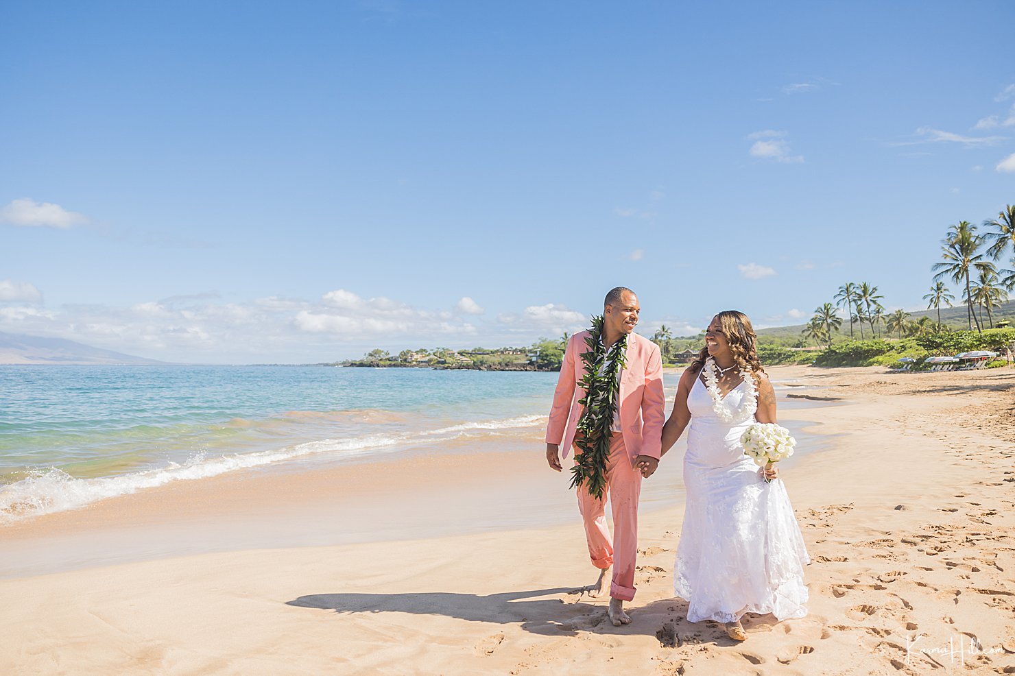 bride and groom on maui beach 
