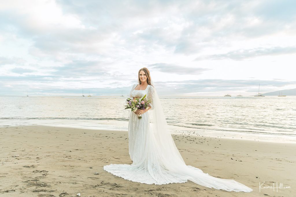 Maui Wedding Bride in two-piece dress and dramatic veil