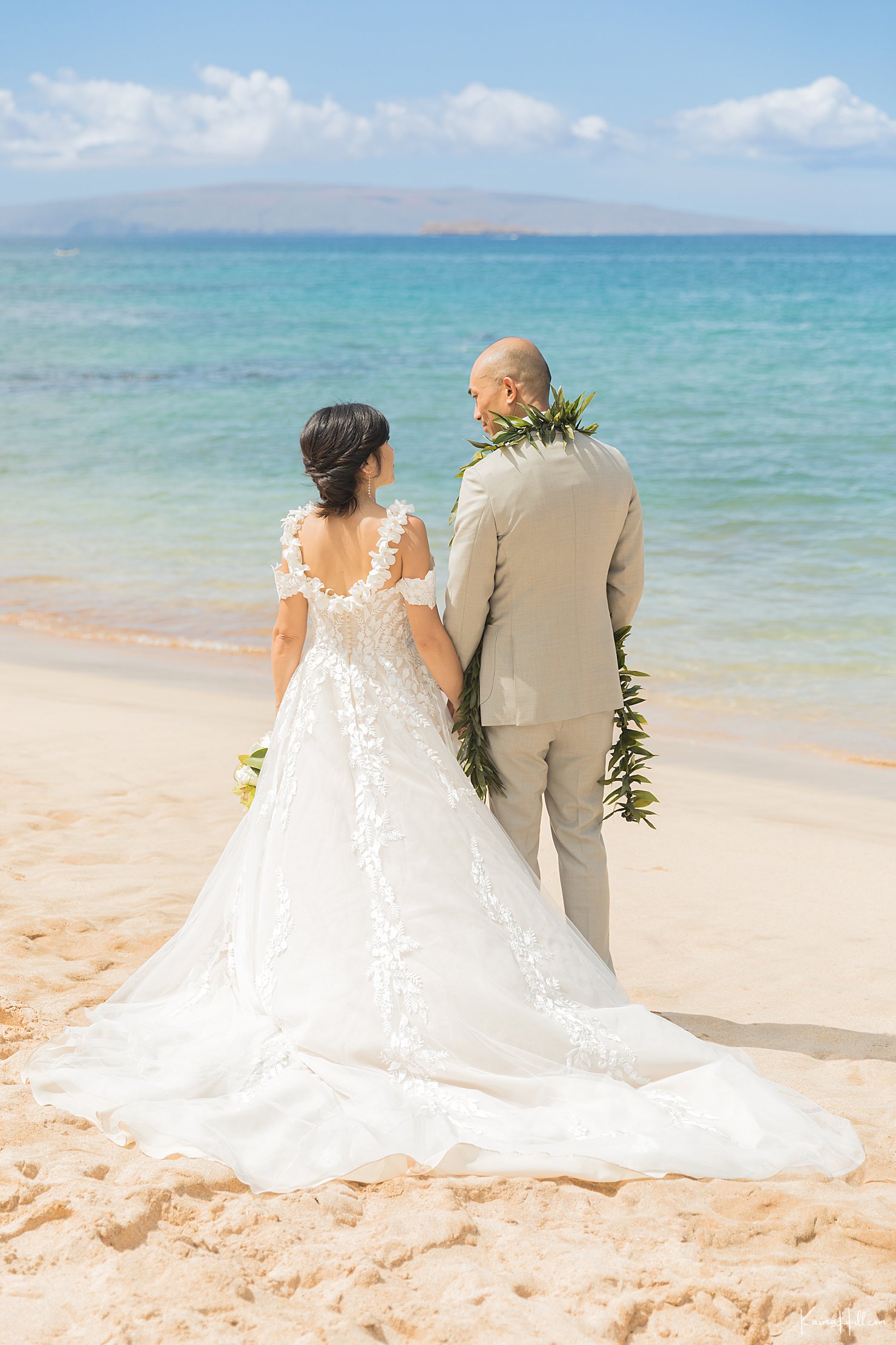 new couple on beach in maui