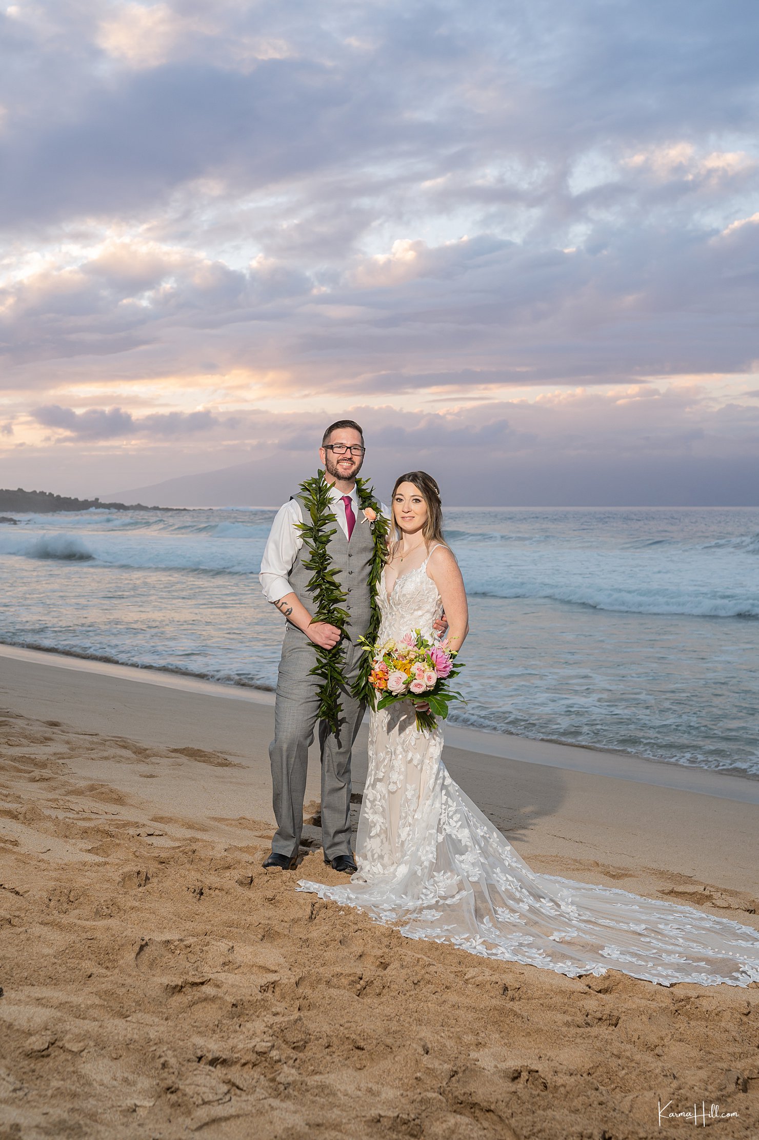 newlyweds at sunset in maui