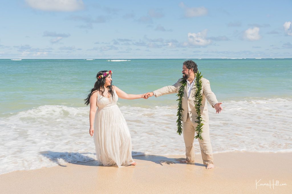 newlyweds in maui on beach