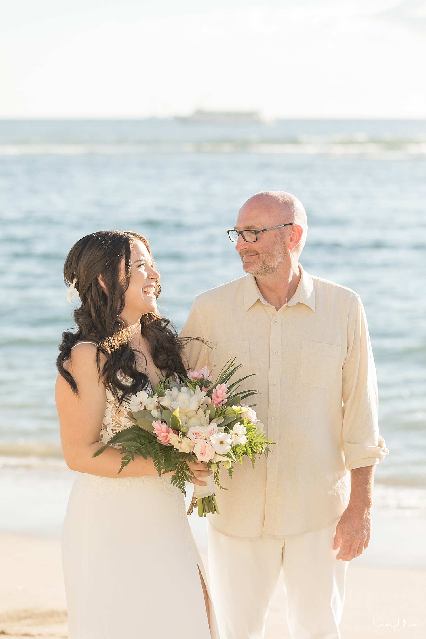 Bride and groom on maui beach wedding