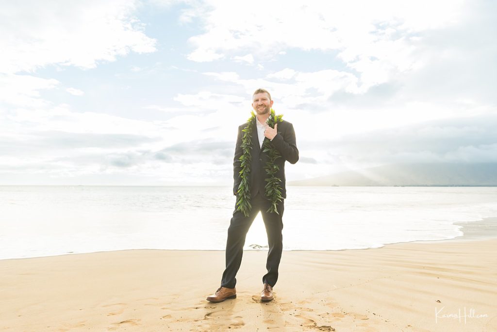 Maui elopement groom with lei