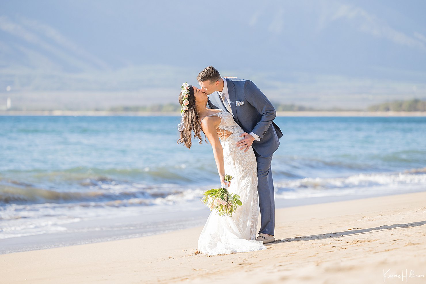 happy newlyweds on beach