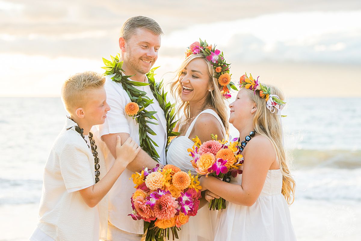 Maui vow renewal with mom, dad, son and daughter with gorgeous floral