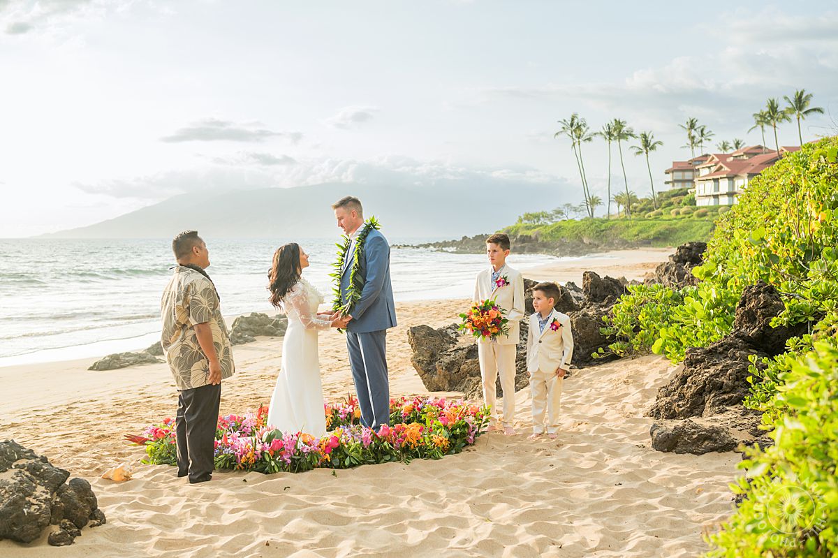 Maui vow renewal on the beach with kids in suits